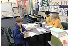 Younger students focus on their writing during our Literacy Festival 2014